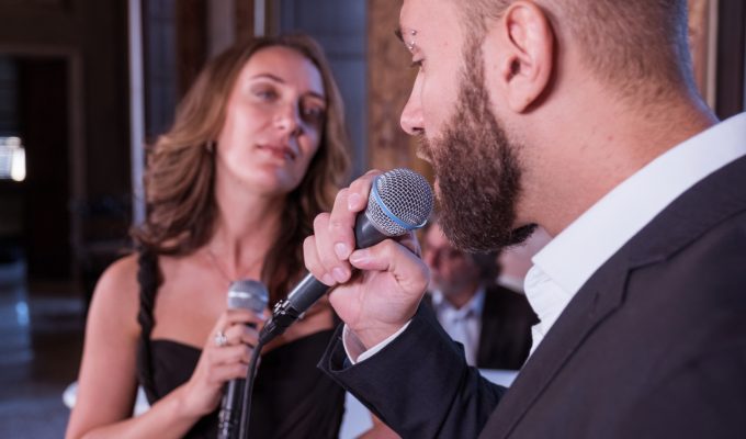 female and male singer performing