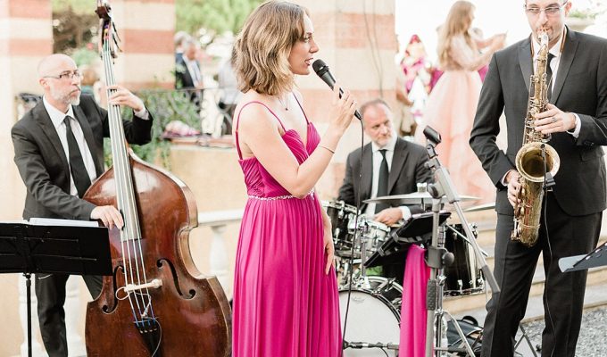 jazz band performing in a garden for a wedding